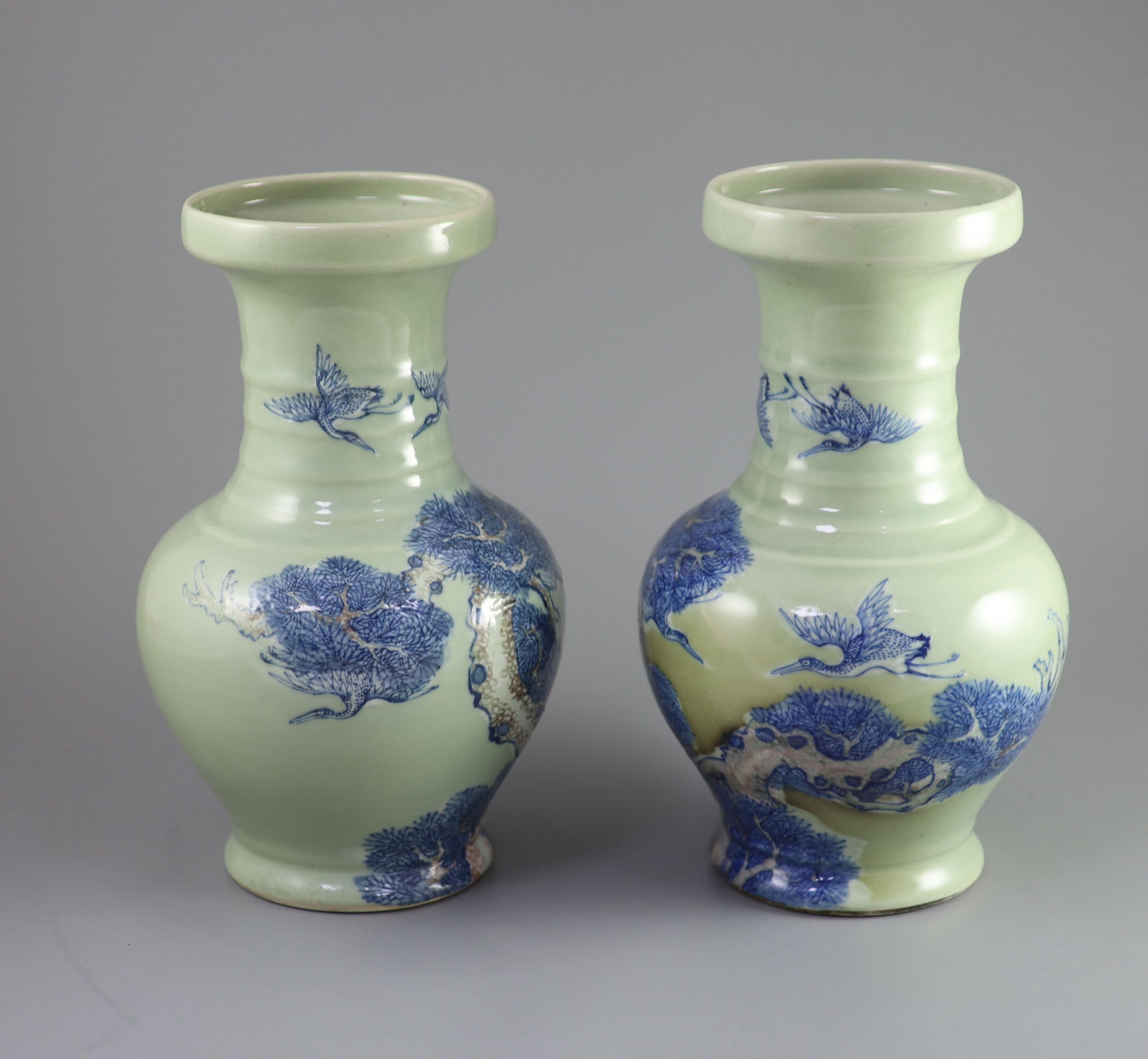 A pair of Chinese underglaze blue and copper red celadon ground vases, probably Republic period 31.5 and 32 cm high